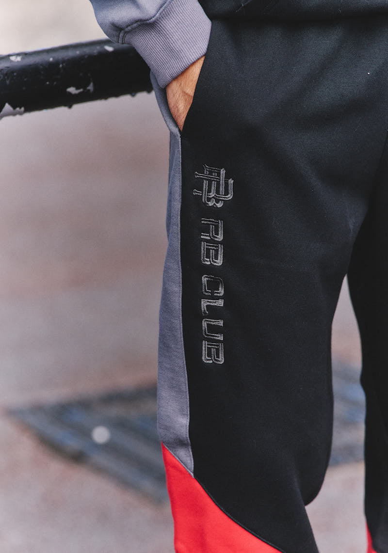 CLUBRA CUFFED SWEATPANTS - BLACK & RED